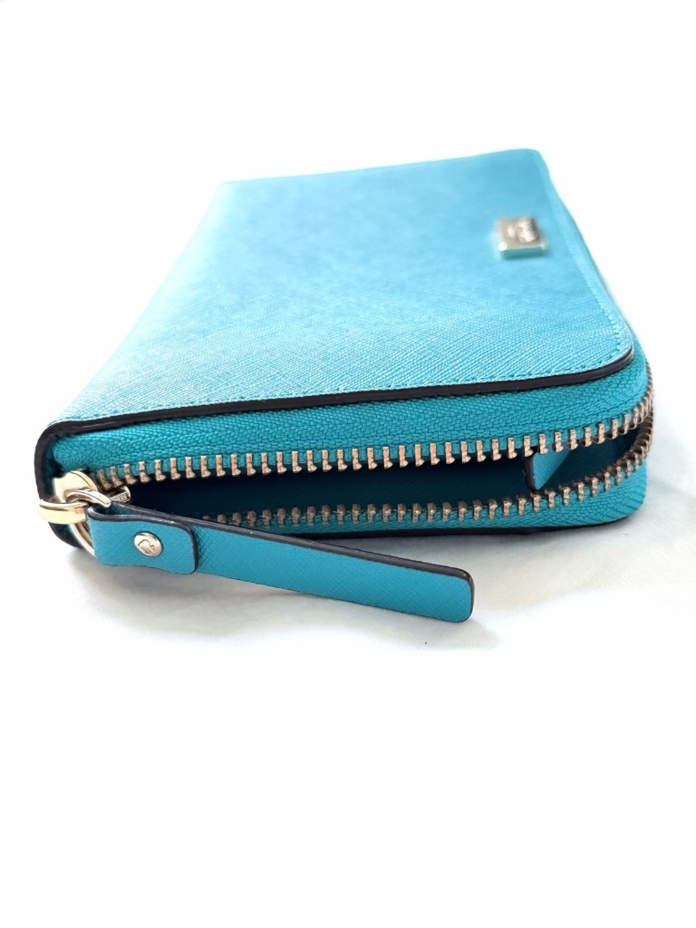 Kate Spade Zip-Around Wallet
Turquoise